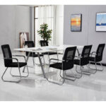 Black mesh medium-back conference chair with integrated armrests and a chrome sled base frame.
