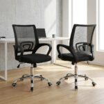 Black clerical office chair shown in a pair from front and angled perspectives, featuring a breathable black mesh mid-back backrest with integrated lumbar support, a contoured fabric-padded seat cushion, fixed curved nylon armrests, a pneumatic height-adjustment mechanism, and a polished chrome five-star swivel base on dual-wheel casters.