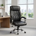 Black leather high back executive office chair with diamond tufted backrest, contrast stitching, and chrome swivel base.