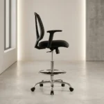 Adjustable Mesh Cashier Chair Improve comfort and efficiency with this Adjustable Mesh Cashier Chair, designed to provide ergonomic support, breathability, and long-lasting durability. It is an ideal seating solution for cashiers, reception desks, customer service counters, supermarkets, banks, pharmacies, retail stores, and office workstations. Its modern mesh design promotes airflow while ensuring maximum comfort during extended working hours. Manufactured with premium materials and a reinforced frame, this adjustable mesh cashier chair is built for everyday commercial use. As a result, it offers reliable performance and exceptional comfort in busy working environments. Ergonomic Mesh Support The breathable mesh backrest provides continuous airflow, helping users stay cool throughout the day. Consequently, it reduces heat buildup and improves comfort during long shifts. Additionally, the ergonomic backrest supports the natural curve of the spine, encouraging healthy posture and reducing lower back fatigue. The padded seat cushion provides excellent comfort while maintaining its shape after regular use, making the chair suitable for prolonged sitting. Adjustable Features This cashier chair includes an adjustable seat height mechanism, allowing users to customize the chair according to counter height and personal preference. The supportive foot ring provides additional comfort by reducing pressure on the legs during extended working periods. The 360-degree swivel function enables effortless movement, allowing users to access workstations and equipment without unnecessary strain. Smooth caster wheels further improve mobility across various floor surfaces. Durable Construction Built with a heavy-duty frame and stable base, this chair delivers outstanding strength and durability for daily commercial use. The quality mesh upholstery resists wear while maintaining a modern professional appearance. Moreover, the reinforced construction ensures dependable support throughout years of continuous operation. The mesh and seat surfaces are also easy to clean, requiring minimal maintenance to maintain a neat appearance. Modern Professional Design Its contemporary design complements reception counters, cashier stations, office desks, and retail environments. As a result, it blends seamlessly with modern commercial interiors while enhancing workplace comfort and efficiency. Key Features Premium adjustable mesh cashier chair Breathable ergonomic mesh backrest Comfortable padded seat Adjustable seat height Supportive foot ring 360-degree swivel function Smooth caster wheels Heavy-duty stable base Benefits Promotes healthy sitting posture Reduces fatigue during long shifts Improves workplace comfort and productivity Provides long-lasting durability Ideal for supermarkets, banks, pharmacies, retail stores, reception areas, cashier counters, and office workstations