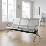 3-seater steel waiting bench constructed from heavy-duty polished stainless steel, featuring three connected contoured seats with breathable perforated backrests and seat pans, curved steel armrests on both ends, and a robust horizontal support beam anchored by flared, arched legs with adjustable leveling feet.