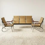 Beige leather 5-seater reception sofa set comprising a 3-seater bench and two matching single armchairs with curved metal frames.