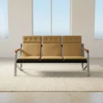 Beige leather 5-seater reception sofa set comprising a 3-seater bench and two matching single armchairs with curved metal frames.