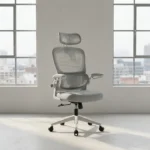 Light blue high-back executive ergonomic office chair with a mesh backrest, matching headrest, flip-up armrests, and a white 5-star swivel base.