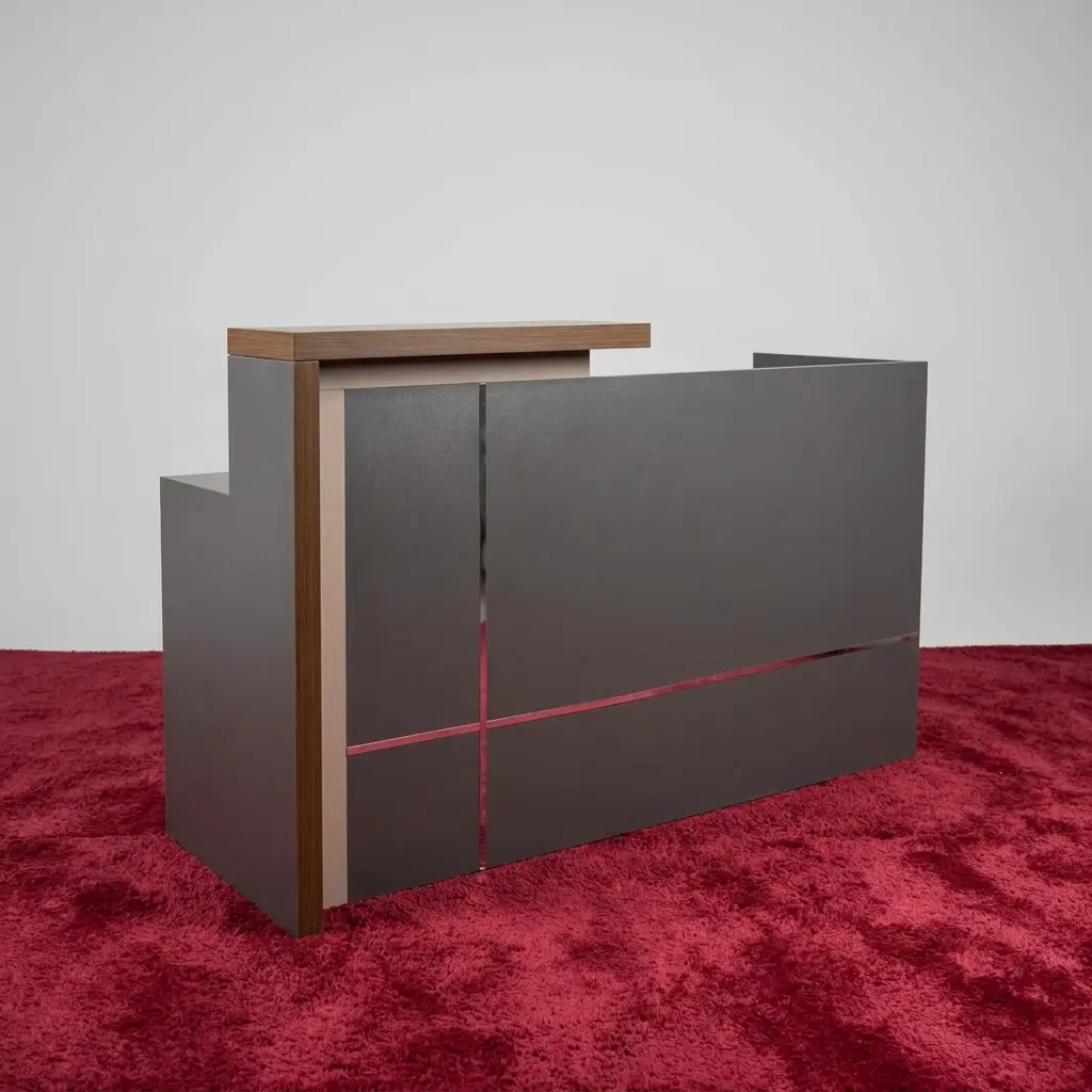 1800mm reception office desk shown from front and rear interior angles, featuring a dark gray matte front privacy facade detailed with a wood-accented elevated transaction counter and silver metallic trim inlay lines, opening into a rear workspace equipped with a natural walnut wood grain desktop and an integrated lockable grey storage pedestal.
