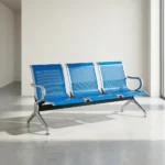 Blue reception waiting bench featuring three connected contoured seats made of perforated metal finished in a vibrant royal blue gloss powder coating, bordered by polished chrome trim, and supported by heavy-duty arched chrome armrests and matching flared steel legs with adjustable levelling glides.