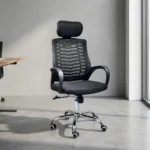 Ergonomic headrest office chair featuring a high backrest in breathable black mesh with a horizontal chevron spine support design, an independent cushioned fabric headrest, fixed sloping loop armrests, a padded black fabric seat cushion, a pneumatic height-adjustment lever, and a polished chrome five-star swivel base equipped with hooded dual-wheel casters.