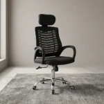 Black headrest office chair featuring a high backrest in breathable black mesh with a horizontal chevron spine support design, an independent cushioned fabric headrest, fixed sloping loop armrests, a padded black fabric seat cushion, a pneumatic height-adjustment lever, and a polished chrome five-star swivel base equipped with hooded dual-wheel casters.
