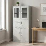 Office cabinet with safe featuring a heavy-duty white steel modular construction, designed with a top double-door storage compartment with rectangular glass viewing panels, a middle section containing three stacked utility drawers next to a single key-locked locker door, and a lower double-door storage cabinet, all equipped with integrated flush-mount handles and independent security key locks.