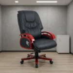 Executive reclining office chair shown in a side profile, featuring a high-back design upholstered in tufted black bonded leather with contrasting red stitching, constructed with curved wooden armrests and accents finished in a rich cherry wood stain, an integrated silver mechanical recline lever on the side panel, and a matching cherry-stained five-star swivel base with dual-wheel casters.