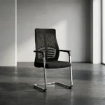 Ergonomic mesh office visitor chair featuring a breathable black mesh backrest with a distinctive skeletal, horizontal-ribbed dual lumbar support design, a contoured padded black fabric seat cushion, and fixed black armrests, all supported by a sleek polished chrome cantilever sled base with non-slip protective floor glides.