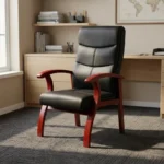 High back leather waiting chair featuring segmented black leather upholstery with horizontal stitching, curved cherry wood armrests, and matching flared wooden legs.