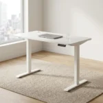 1.2m white electric desk featuring a clean rectangular desktop with rounded corners, dual circular white cable grommets, a black under-desk digital control keypad, and a height-adjustable white telescoping T-leg base.