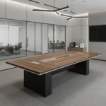 3m conference meeting table featuring a natural wood-grain tabletop with white edge trim, a central silver and black media connectivity track flanked by two rectangular grommet covers, and dual charcoal gray block pedestal legs.