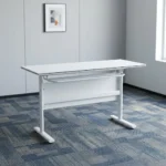 120cm foldable training table featuring a clean white rectangular desktop, an integrated under-desk metal storage shelf, a matching white modesty panel, and a T-bar steel leg base.