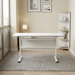 120cm foldable training table featuring a clean white rectangular desktop, an integrated under-desk metal storage shelf, a matching white modesty panel, and a T-bar steel leg base.