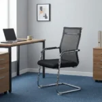 Mesh office guest chair featuring a high, transparent black mesh backrest with a slim chrome top rail, integrated black curved armrests, a contoured padded fabric seat, and a polished chrome cantilever sled base.