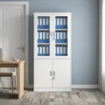 Lockable steel office file cabinet featuring a clean white finish, an upper lockable double-door cupboard with glass display windows revealing interior shelving, and a lower matching solid steel double-door storage cabinet with vertical metal handles.