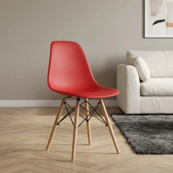 Red Eames plastic chair featuring a molded red plastic shell seat, tapered natural wooden legs, and black metal wire Eiffel-style cross-bracing.