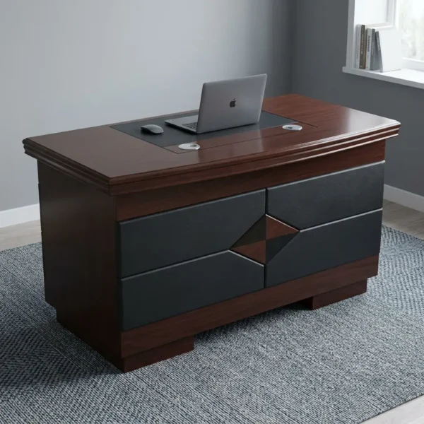 1.2m executive office table featuring a deep, dark brown wood-grain finish, an integrated black writing pad inlay with dual silver grommet holes, and a distinct geometric front modesty panel detailed with black padded panels and a central diamond accent.