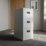 3-drawer metallic filing cabinet featuring a clean light gray steel finish and three vertical storage drawers, each equipped with an integrated black recessed pull handle and a built-in label slot.