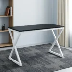 1.2m generic computer table featuring a sleek, rectangular black tabletop with a circular black cable grommet, supported by a modern geometric white metal X-frame leg base.