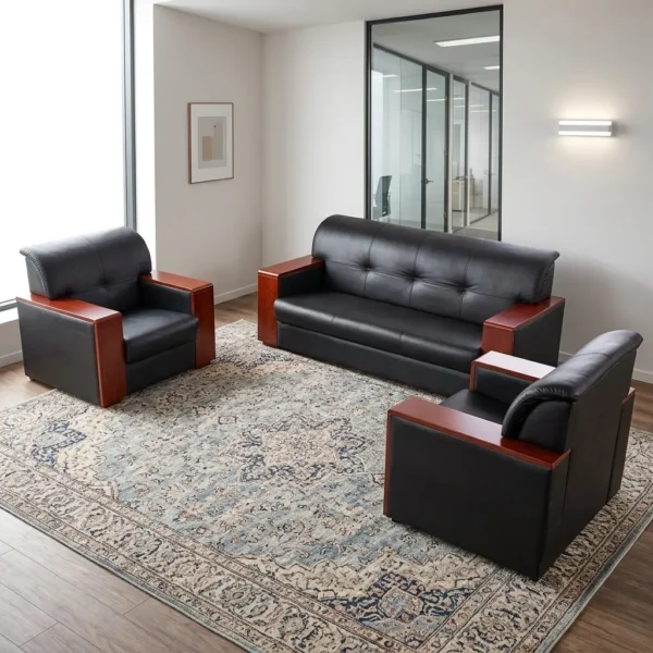 5-seater executive office sofa set featuring premium black leather upholstery with block-tufted backrests and padded headrests, accented by polished reddish-brown wooden panels capping the armrests, including a three-seater sofa and two matching single-seater armchairs.