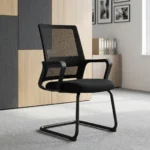 Black mesh boardroom visitor chair featuring a mid-back black mesh backrest with an integrated horizontal lumbar support pad, curved black loop armrests, a contoured padded black seat, and a durable matte black cantilever sled base.