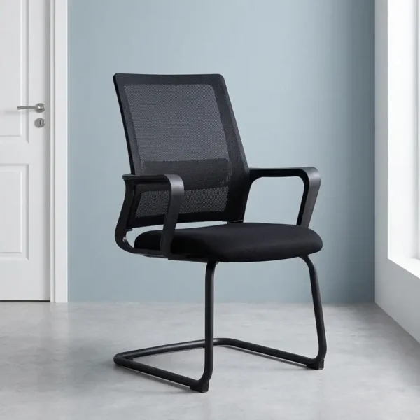 Premium office visitor chair featuring a mid-back black mesh backrest with an integrated horizontal lumbar support pad, curved black loop armrests, a contoured padded black seat, and a durable matte black cantilever sled base.