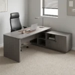 2.0m modern executive office desk featuring a premium dark wood-grain finish, an L-shaped configuration with an attached side return credenza, a thick floating-style tabletop, a front modesty panel accented by a thin gold horizontal line, and a unique gray side pedestal cabinet decorated with an "X" stitch pattern and a central gold accent tab.
