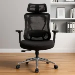 Executive orthopedic office chair featuring a high-back design with an adjustable mesh headrest equipped with an integrated rear coat hanger, a contoured black mesh backrest supported by a polished chrome structural outer frame and an adjustable lumbar support system, flat T-shaped adjustable armrests, a thickly cushioned black fabric seat, and a polished aluminum five-star swivel base with dual-wheel casters.