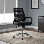 Mid-back mesh staff chair featuring a contoured black mesh backrest with a slatted or ribbed horizontal support skeleton, curved black loop armrests, a thickly padded black fabric seat cushion, and a polished chrome five-star swivel base equipped with twin-wheel casters.