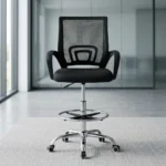 Adjustable reception cashier chair featuring a breathable black mesh backrest with built-in lumbar support, curved fixed armrests, a plush black fabric seat cushion, a pneumatic height-adjustment lever, an integrated chrome foot ring, and a heavy-duty chrome five-star swivel base with smooth-rolling casters.