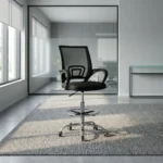 Adjustable reception cashier chair featuring a breathable black mesh backrest with built-in lumbar support, curved fixed armrests, a plush black fabric seat cushion, a pneumatic height-adjustment lever, an integrated chrome foot ring, and a heavy-duty chrome five-star swivel base with smooth-rolling casters.