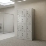 12-locker filing cabinet featuring a durable light-gray steel frame arranged in a 3-column by 4-row grid, with each individual compartment fitted with an inset vertical handle, key-lock security mechanism, label holder slot, and lower ventilation louvers.