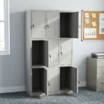 9-locker steel filing cabinet featuring a durable light-gray metal construction arranged in a 3-column by 3-row grid, with individual lockable compartments equipped with inset vertical handles, key-lock mechanisms, label holder slots, and lower ventilation louvers.