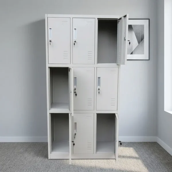 9-locker steel filing cabinet featuring a durable light-gray metal construction arranged in a 3-column by 3-row grid, with individual lockable compartments equipped with inset vertical handles, key-lock mechanisms, label holder slots, and lower ventilation louvers.