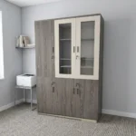 3-door wooden executive cabinet featuring a two-tone finish with taupe wood-grain laminate, upper cream-framed glass display doors revealing internal shelving, lower solid wooden doors, modern dark vertical handles, and key-lock security mechanisms.