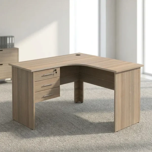 1.2m L-shaped office table featuring a light oak wood-grain laminate finish, a curved corner work surface, a built-in cable grommet, an integrated 3-drawer pedestal unit with lockable storage, sleek metal bar handles, and matching wooden panel legs.