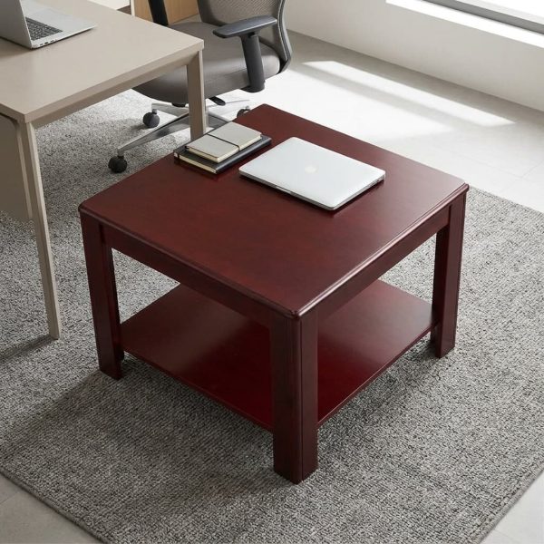 Wooden square coffee table featuring a rich mahogany finish, a smooth square tabletop, a built-in lower storage shelf, and sturdy straight wooden legs.