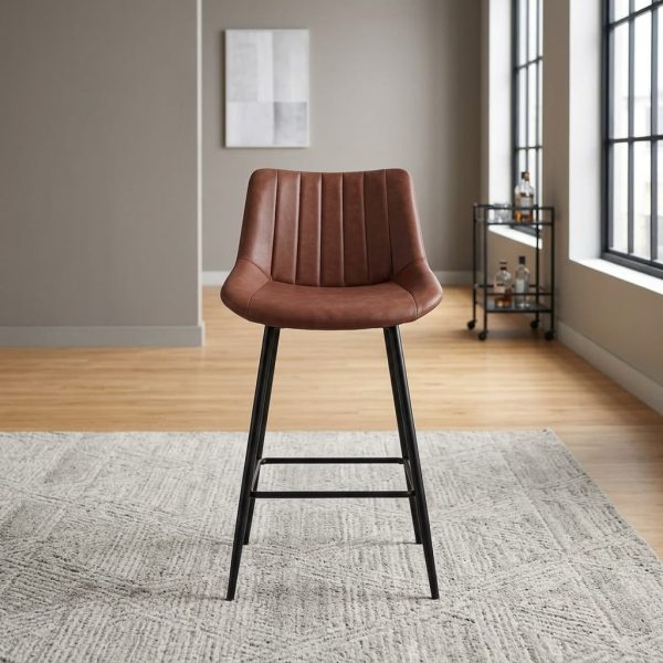 Brown leather barstool featuring a channel-tufted brown leatherette bucket seat, an armless profile, slender black metal legs, and integrated footrest rungs.