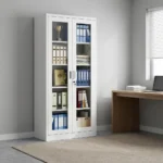 Lockable full glass office cabinet featuring a white powder-coated steel frame, dual full-length framed glass doors with vertical handles, a central key lock security system, and five interior storage shelves.