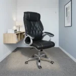 High back leather executive chair featuring a dark charcoal leatherette upholstery with diamond-tufted backrest detailing and contrast stitching, padded loop armrests on silver-finished frames, pneumatically adjustable height controls, and a polished chrome five-star swivel base with caster wheels.