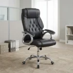 High back leather executive chair featuring a dark charcoal leatherette upholstery with diamond-tufted backrest detailing and contrast stitching, padded loop armrests on silver-finished frames, pneumatically adjustable height controls, and a polished chrome five-star swivel base with caster wheels.