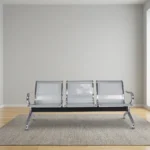 Non-padded steel waiting bench featuring a 3-seater design with perforated silver metallic seats and backrests, curved chrome armrests, a sturdy crossbar beam support, and angled chrome legs with non-marking foot glides.
