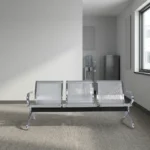Non-padded steel waiting bench featuring a 3-seater design with perforated silver metallic seats and backrests, curved chrome armrests, a sturdy crossbar beam support, and angled chrome legs with non-marking foot glides.