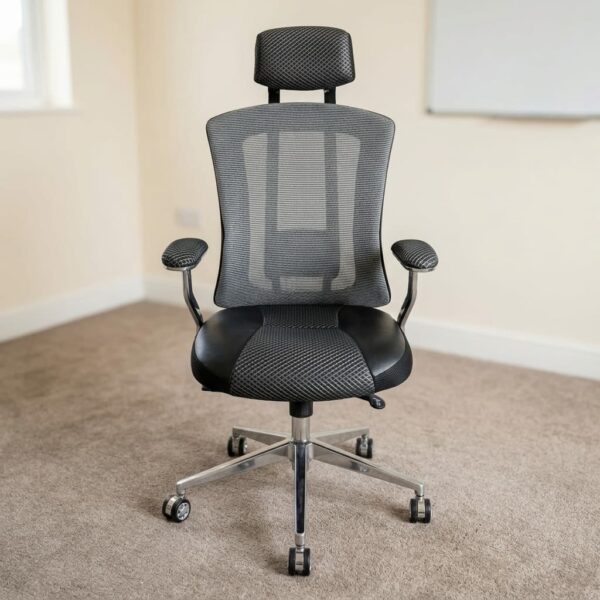 High-back ergonomic mesh office chair featuring an adjustable patterned mesh headrest, a breathable high-back mesh rest with lumbar support framing, a padded seat with patterned central fabric and leatherette side bolsters, padded armrests on metallic supports, pneumatic seat height controls, and a polished metallic five-star swivel base with dual-wheel caster wheels.
