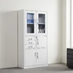 Lockable office cabinet with safe featuring an all-white powder-coated steel construction, upper glass-panel double doors with internal shelving, a middle section with three stacked pull-out drawers alongside a lockable single-door safe compartment, and a lower set of lockable solid double doors.