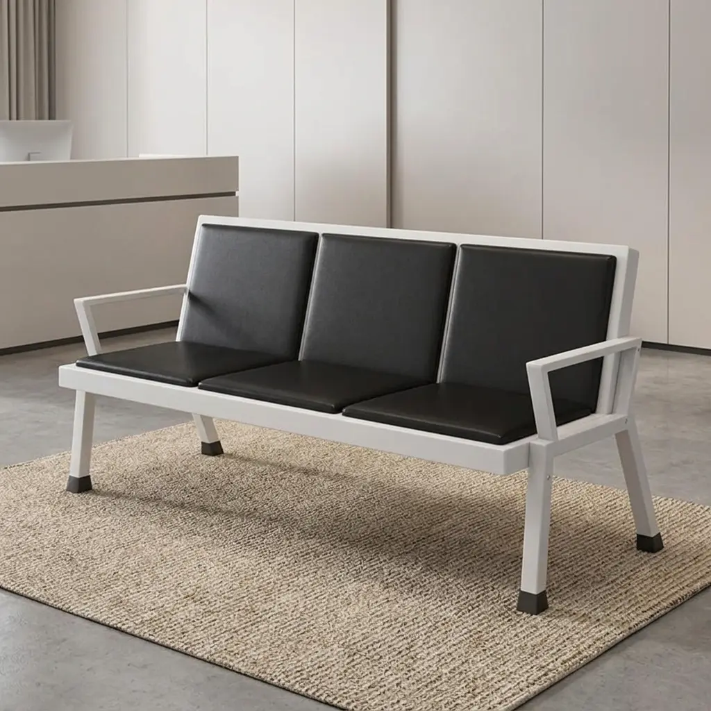Heavy duty padded reception bench featuring three individual dark brown leatherette cushioned seat and backrest panels, integrated rectangular armrests, and a sturdy white powder-coated steel frame with angled support legs and non-slip feet caps.