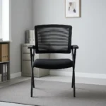 Mesh foldable study chair featuring a breathable black mesh backrest, padded black fabric seat, integrated flat armrests, and a sturdy black powder-coated steel folding frame.